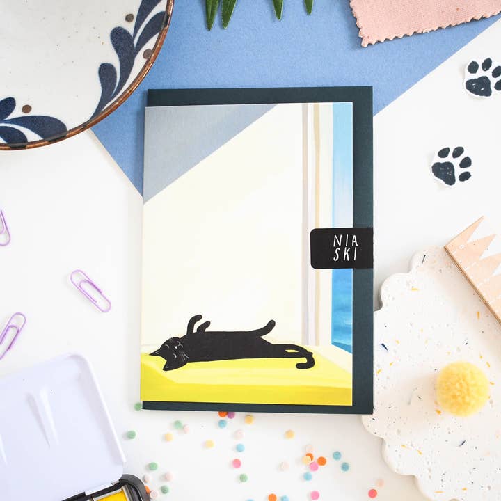 Cat Sun Bathing By The Sea Card