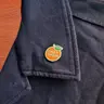 @176 Pronoun Orange Pin -She / He