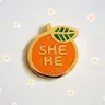 @176 Pronoun Orange Pin -She / He